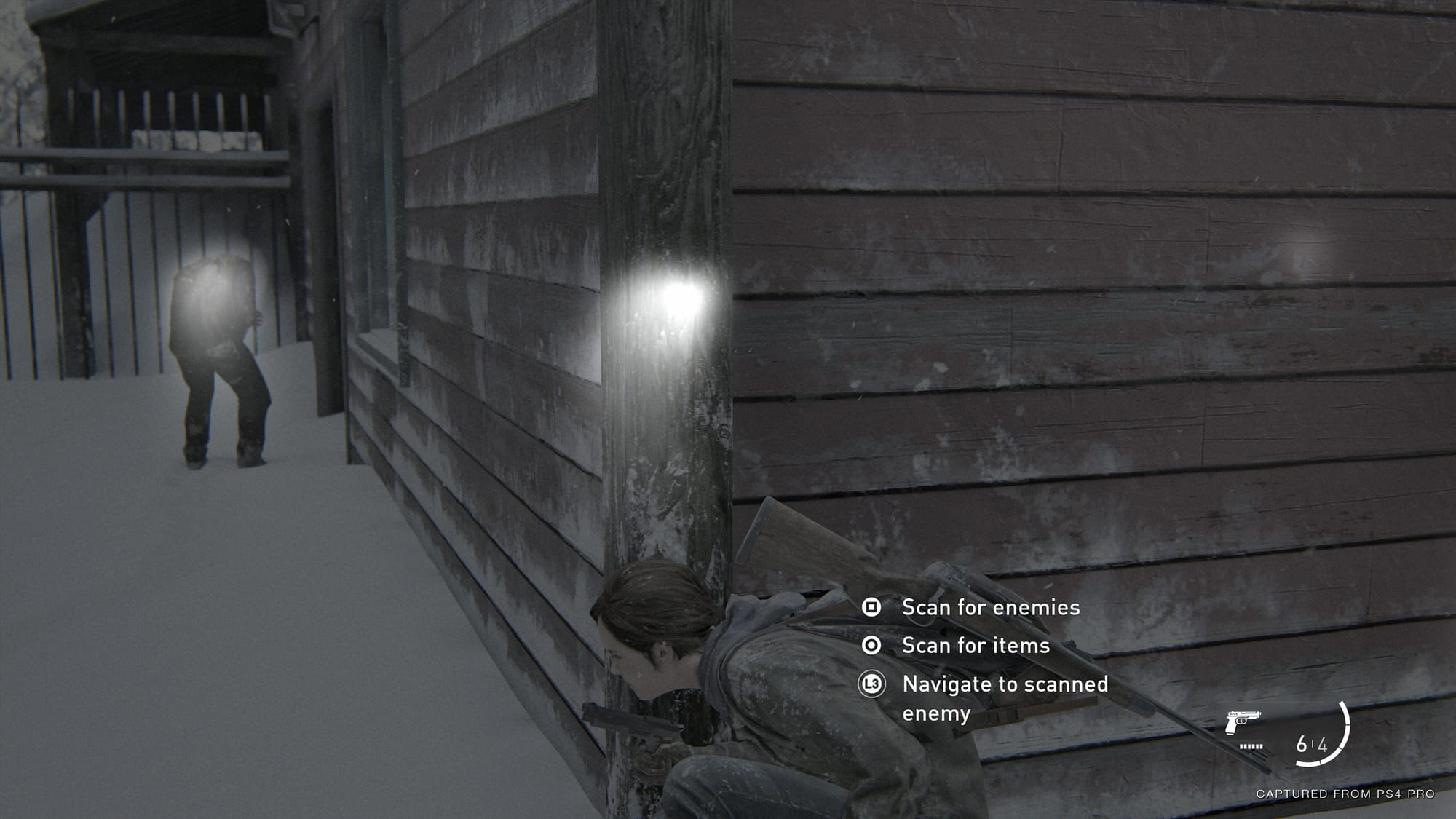 Accessibility options are shown as Ellie sneaks up on an enemy