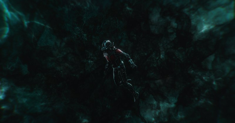 Ant-Man floats in the dark Quantum Realm.