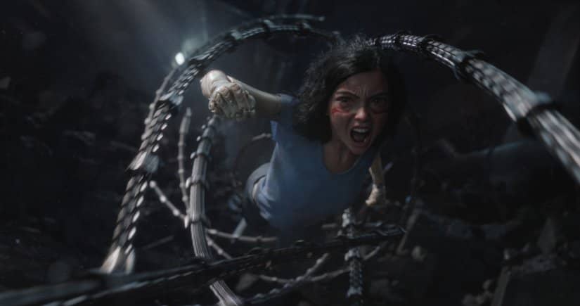 Alita flies through sharp cables threatening to entangled her.