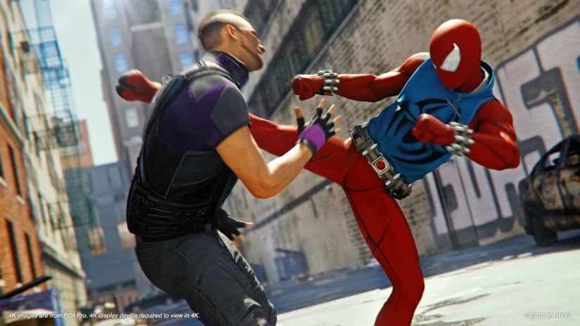 Spider-Man lands a powerful kick on an enemy,
