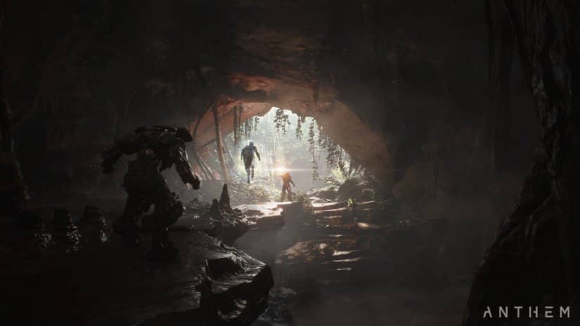 Armored warriors traverse to the cave's opening.