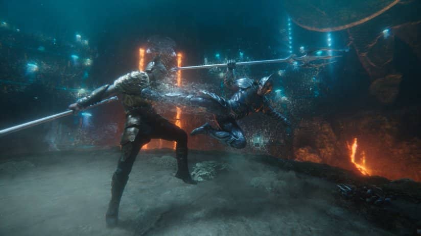 Two armored fighters battle in an underwater arena.